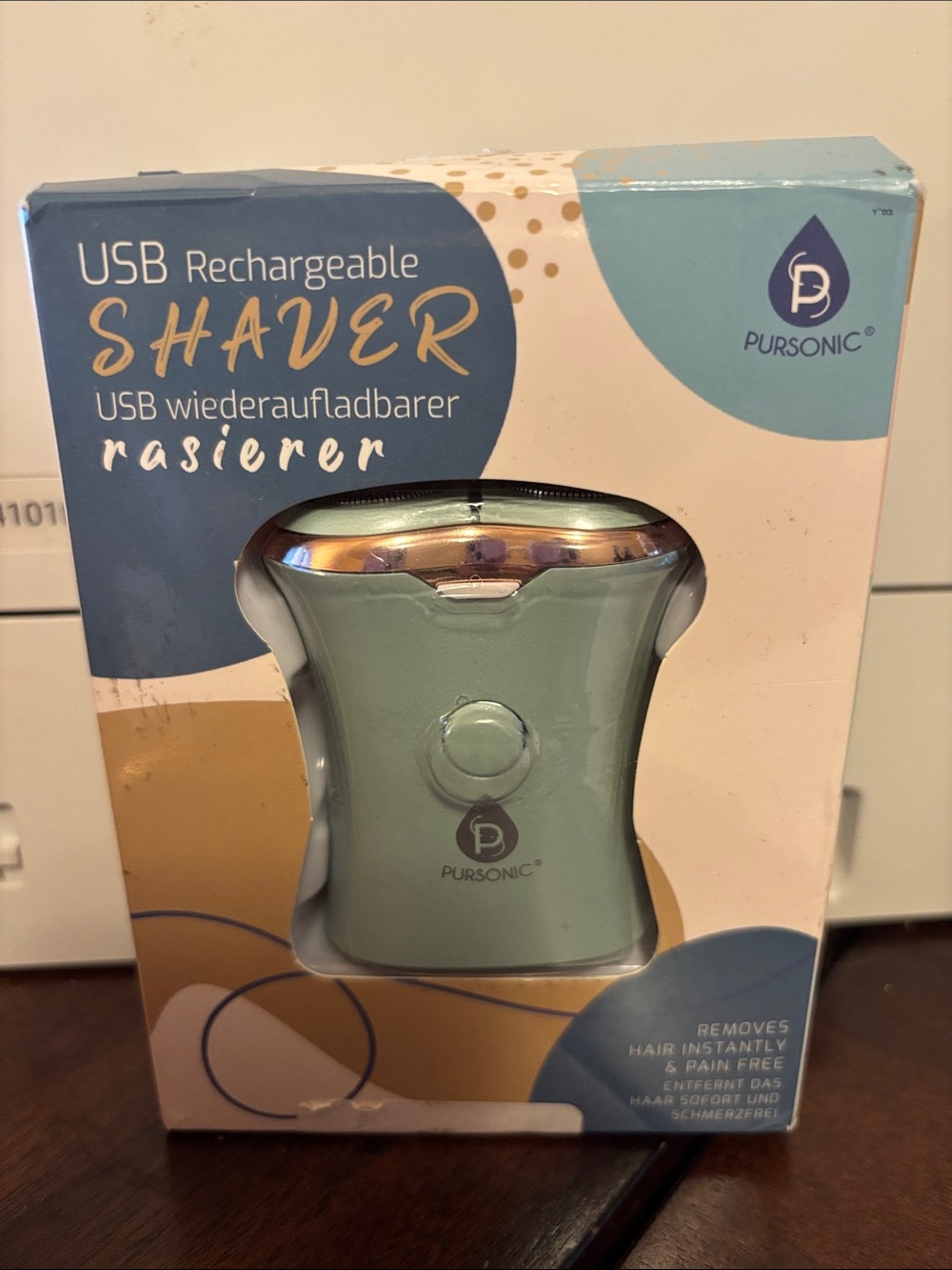 Pursonic USB Rechargeable Shaver — Mint Green. Box dented from shipping.